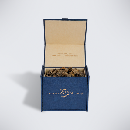Open square blue gift box overflowing with raw agarwood chips, 60 g Mori super agarwood